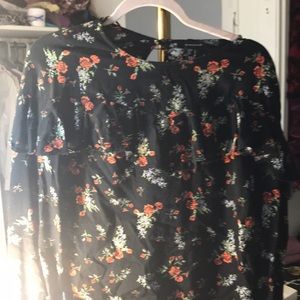 Flowery atmosphere shirt.